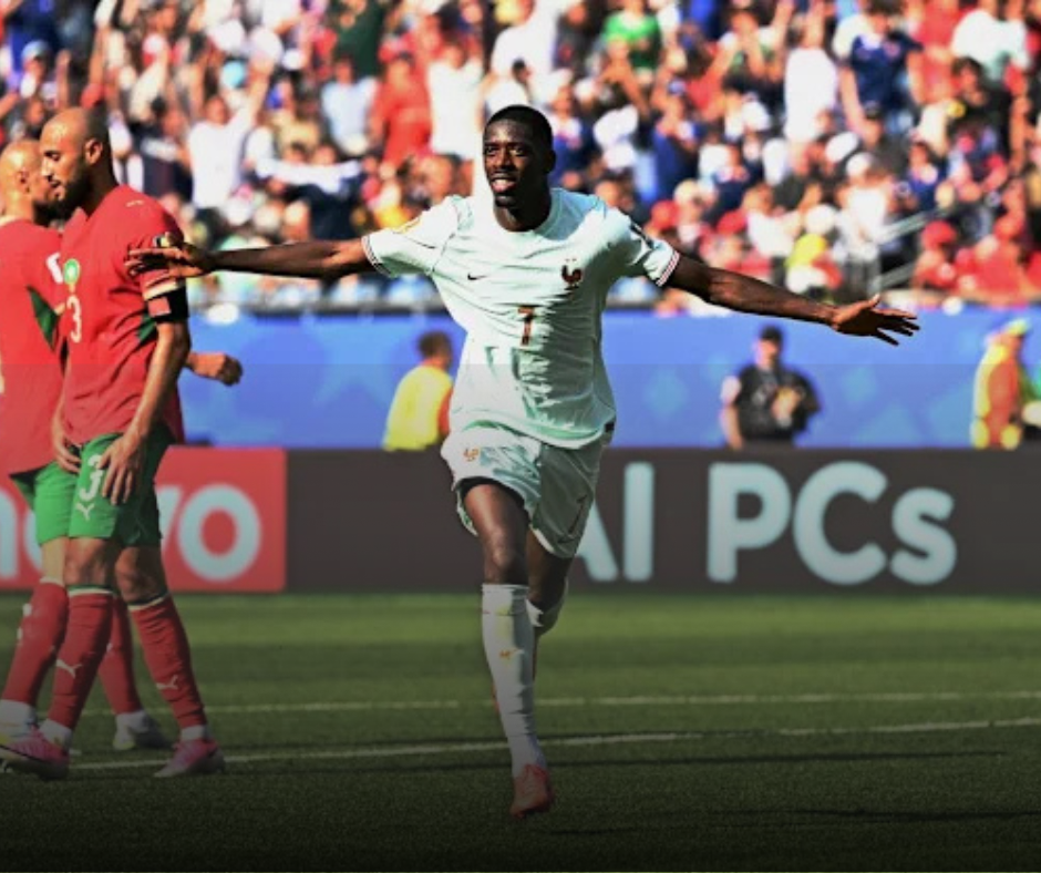 Ousmane Dembele celebrating after scoring France's second goal against Morocco.