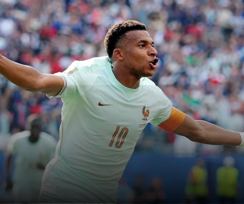 Kylian Mbappe celebrating after scoring France's opening goal against Morocco in the World Cup quarter-final